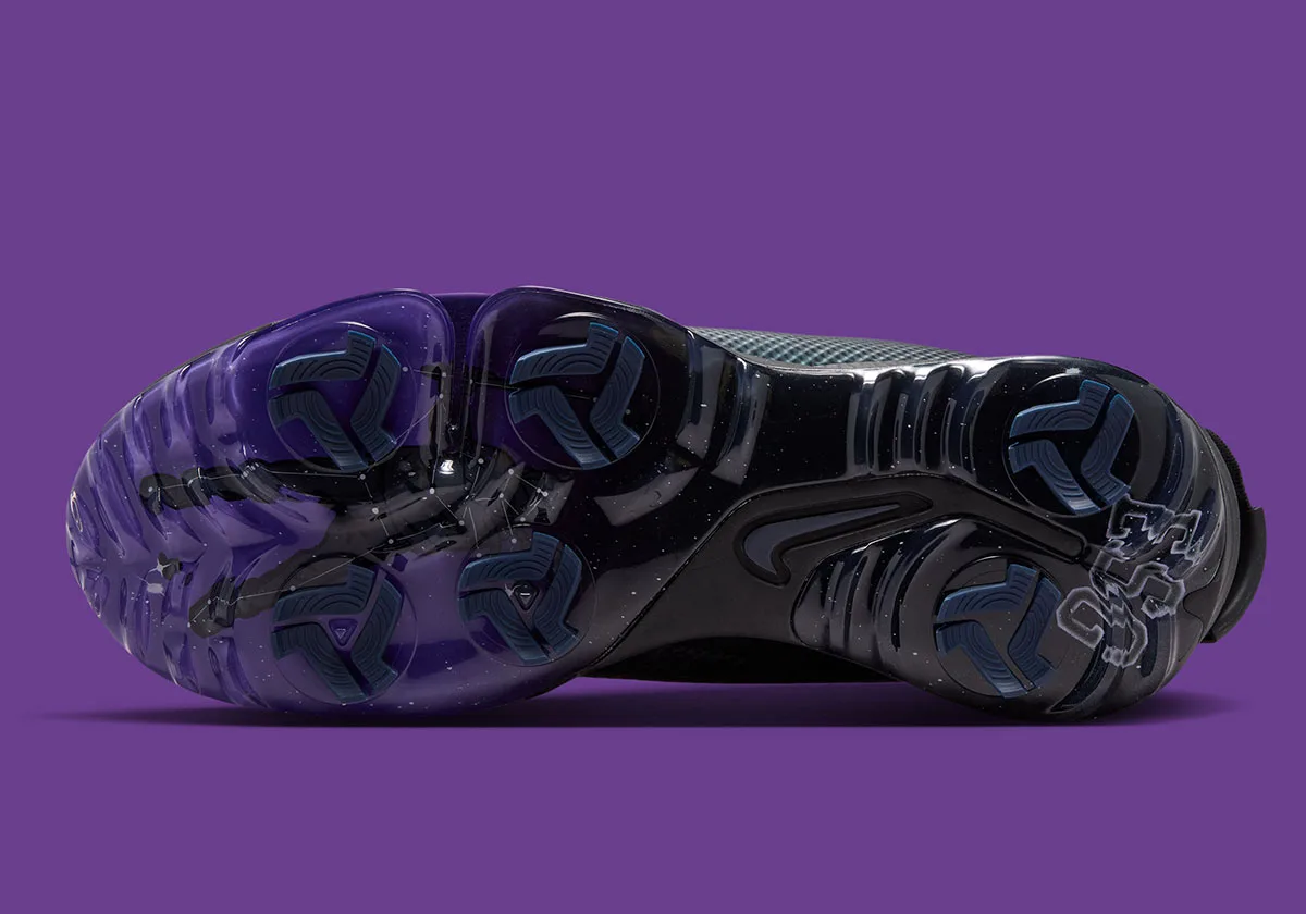 outsole view with translucent purple sole, cleats, and embossed Nike swoosh, x Eastside Golf