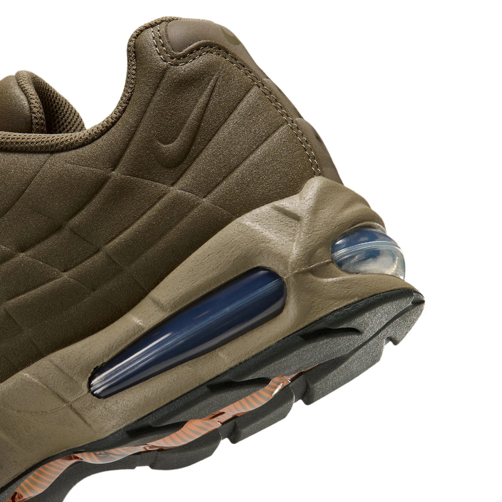 Close-up of heel and outsole showing navy blue air unit and swoosh, I 95