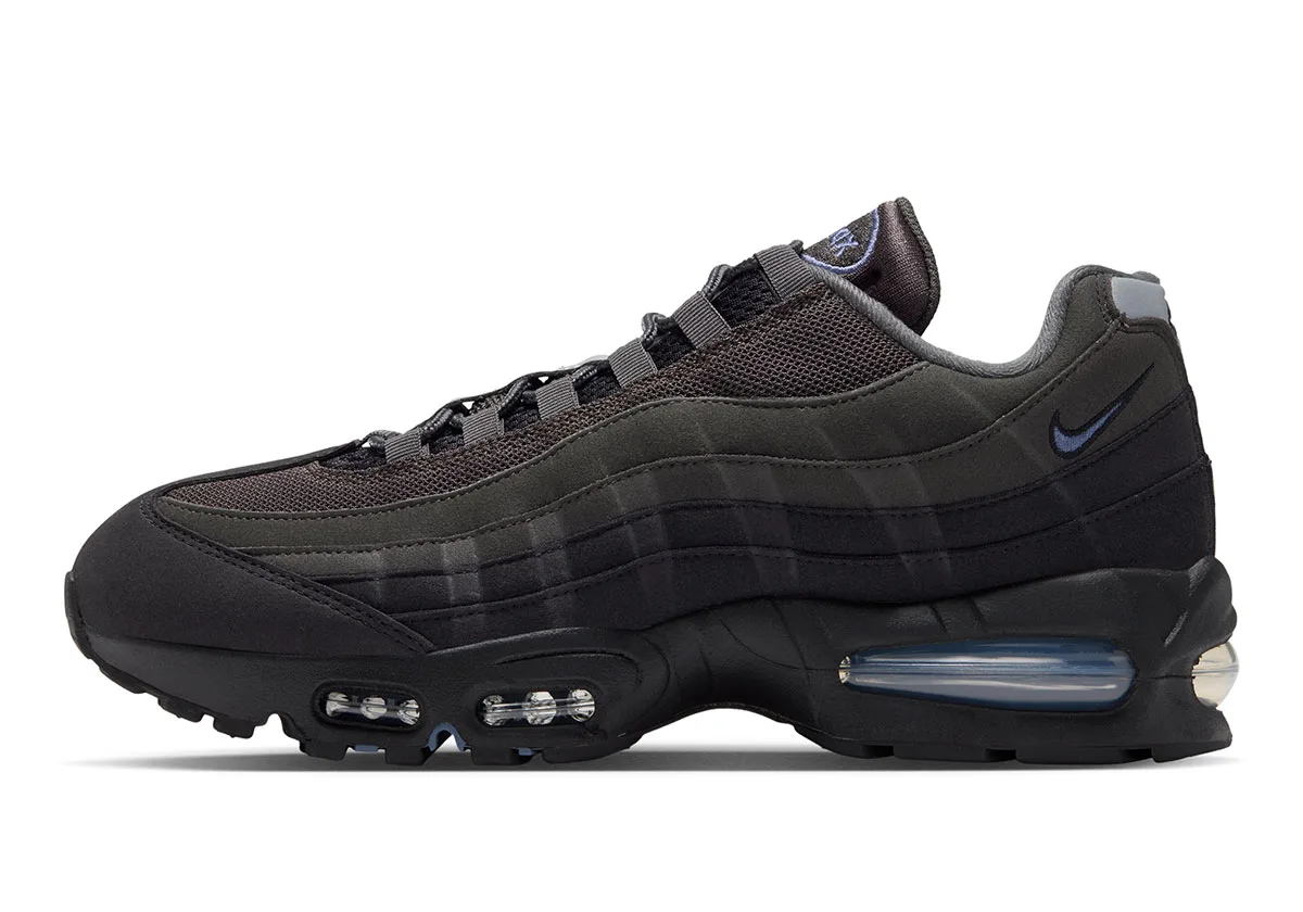 medial view, black and grey layered build with navy swoosh and grey heel tab, Pencil Point
