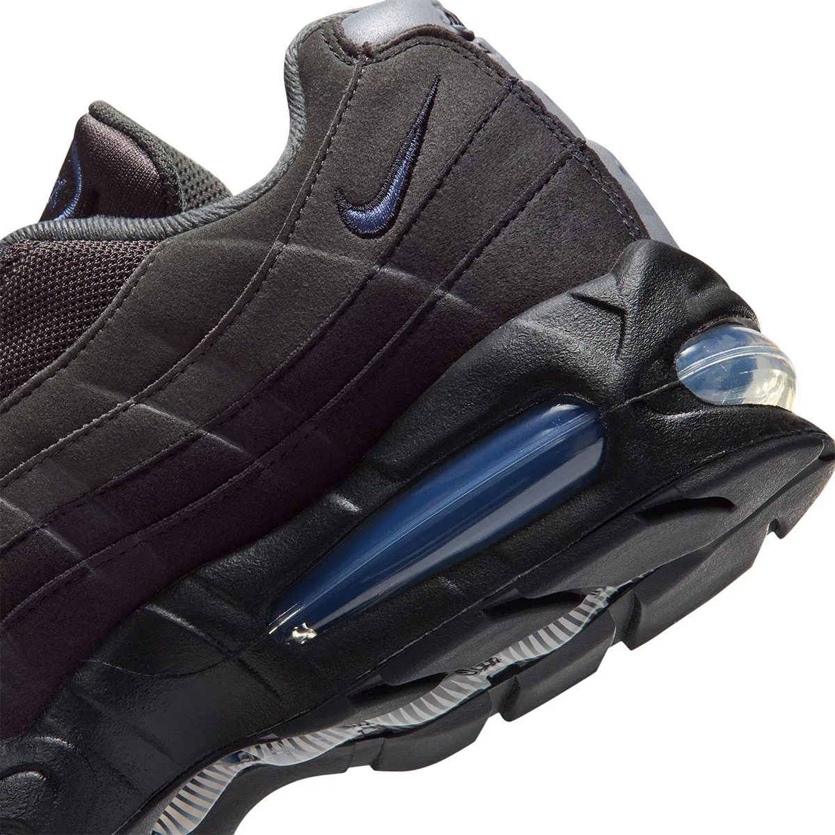 close-up heel and Air unit, navy swoosh and pointed translucent blue bubble, Pencil Point