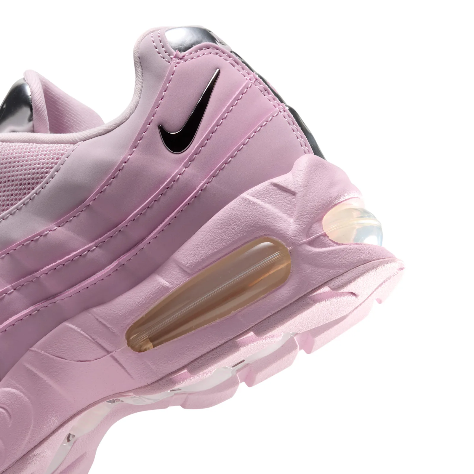 close-up heel and sole detail, silver Swoosh and tan air bubble, Pink Foam