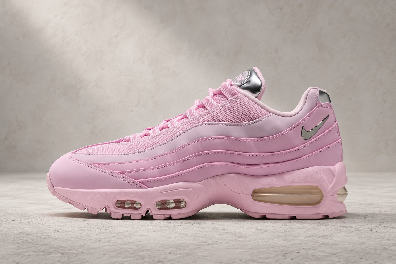lateral view, pink upper with silver heel tab and translucent sole window, Nike Air Max 95 “Pink Foam”