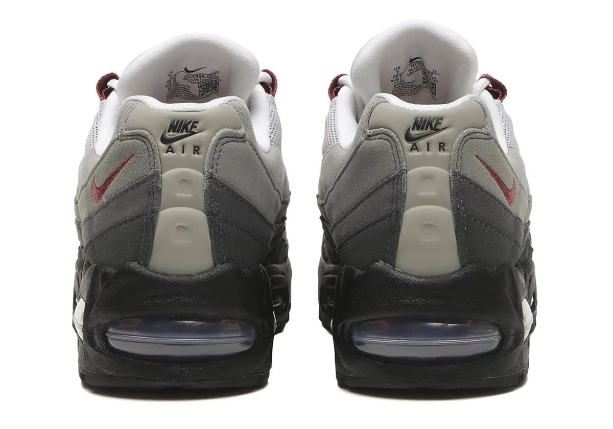 heel view of pair, grey suede with black Nike Air text and burgundy swoosh, Pink Smoke