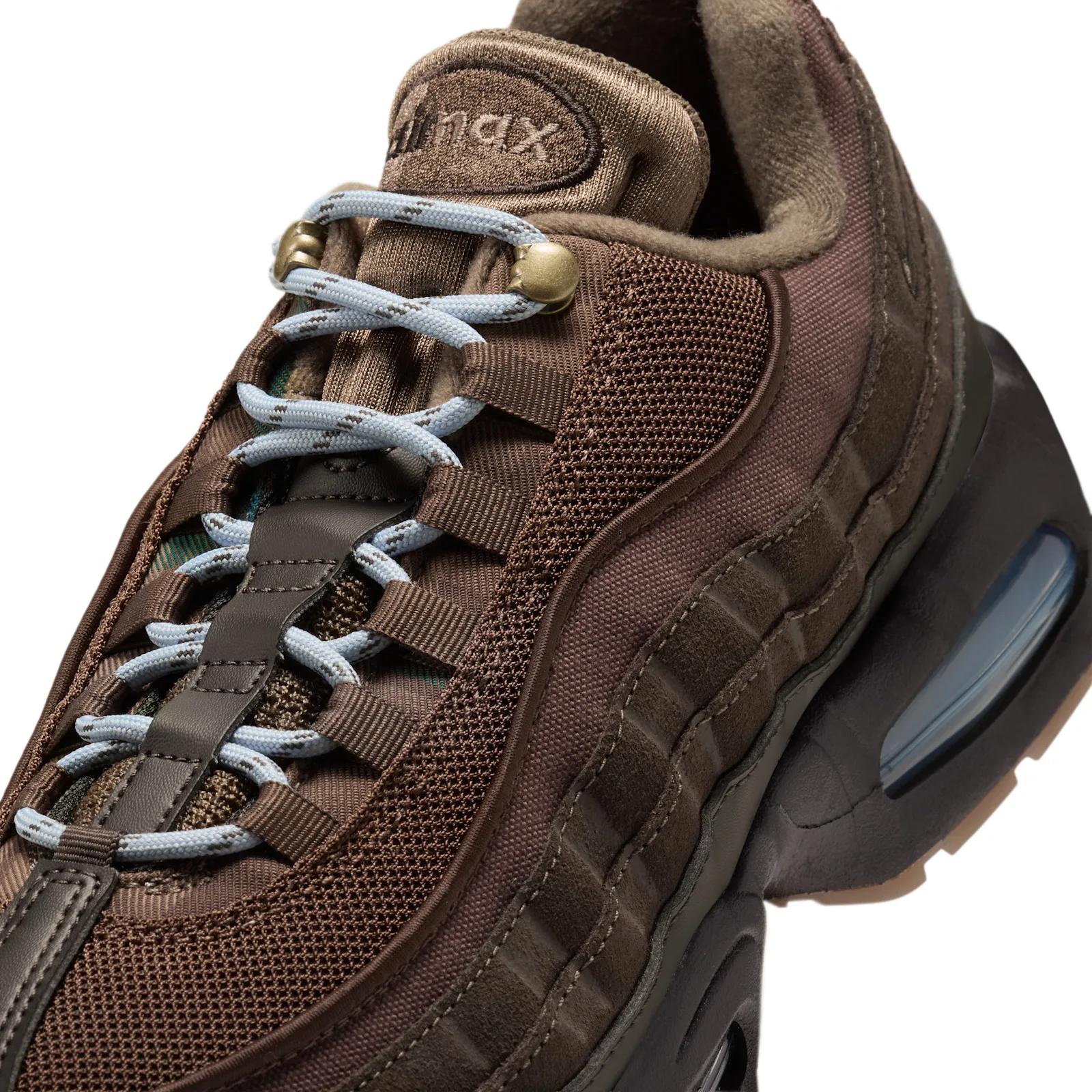 close-up of toe box and eyelets, light blue laces and brass lace locks, Shadow Brown