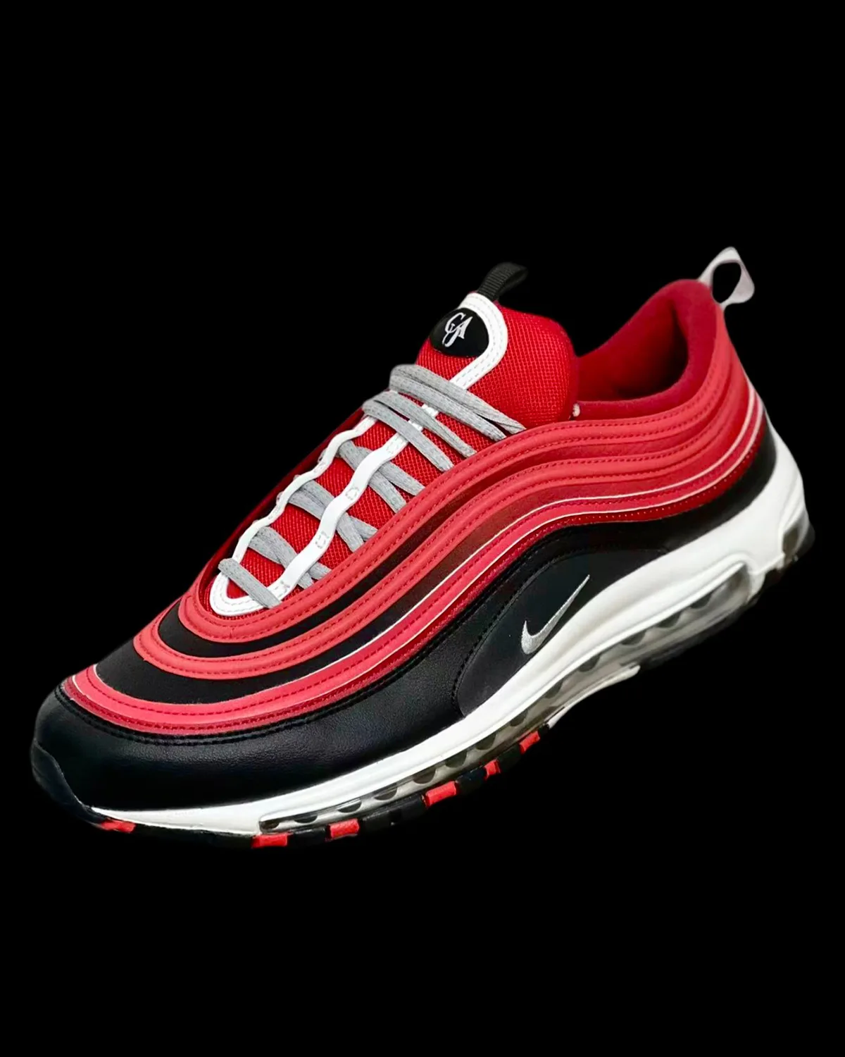 Lateral view, red and black layered leather with GA tongue logo and grey laces, CAU Panthers