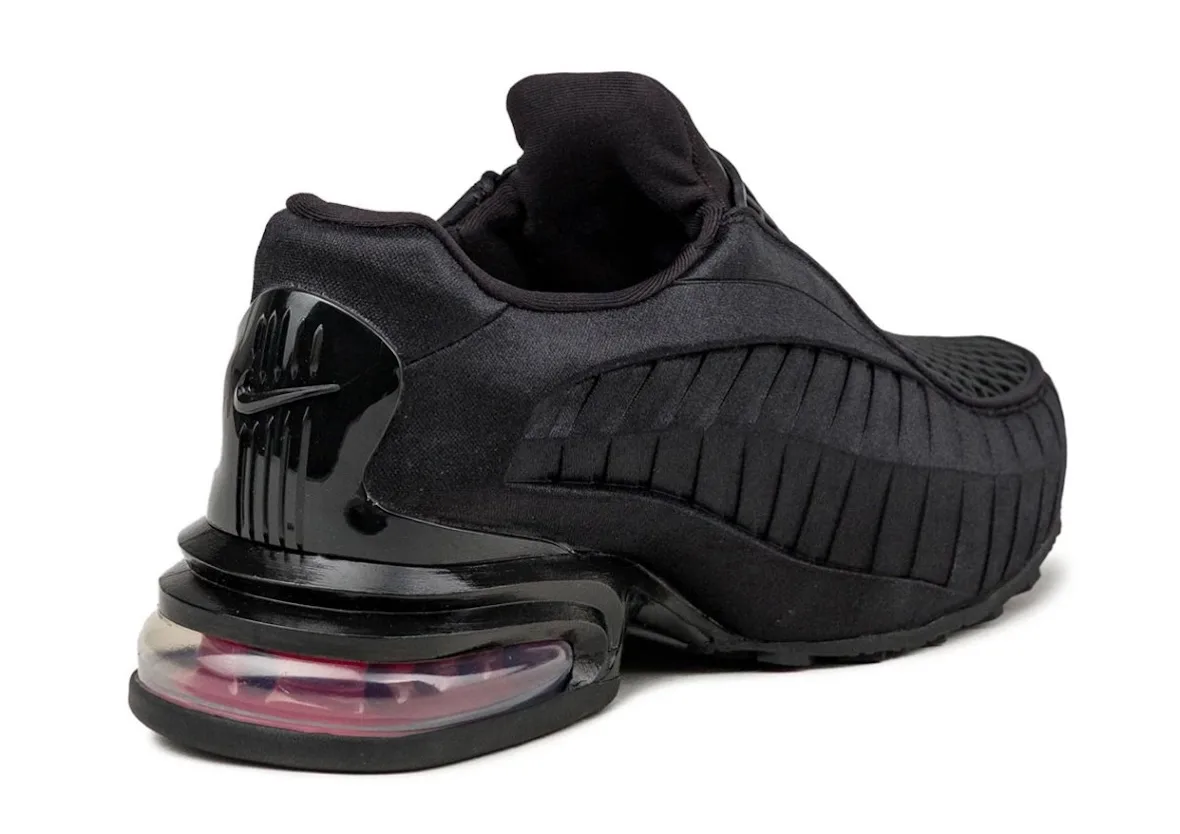 heel view with glossy black Swoosh overlay and exposed red-tinted Air cushioning, Black/Sport Red