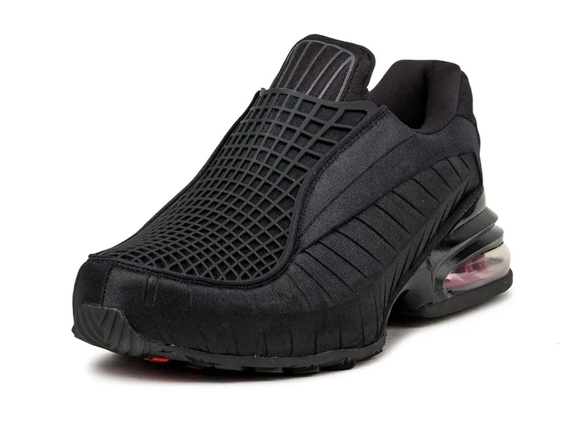 angled toe view showing mesh forefoot panel, ribbed side wall, and red Air bubble, Black/Sport Red
