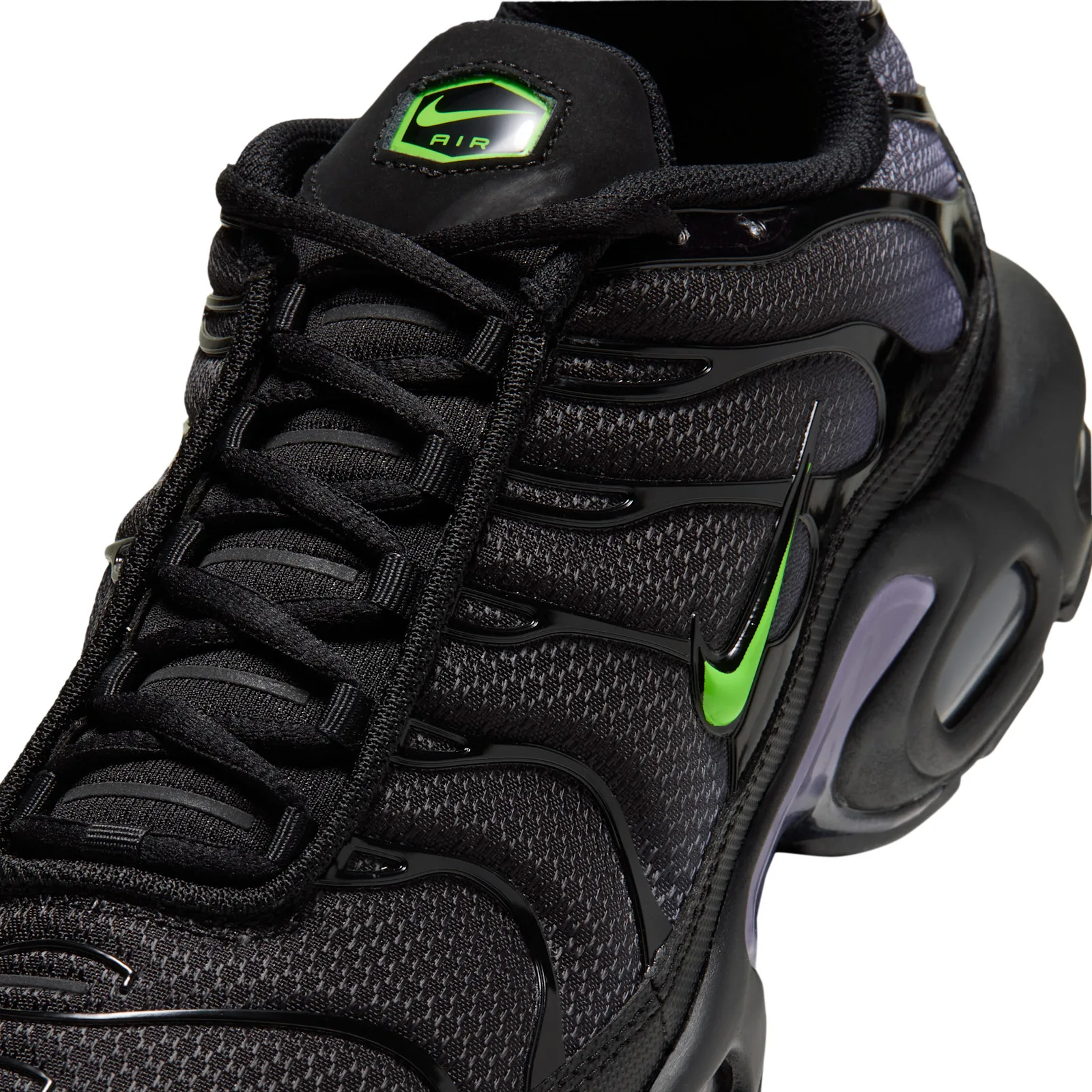 close-up toe and tongue detail, green swoosh and Nike Air tongue tag, Joker