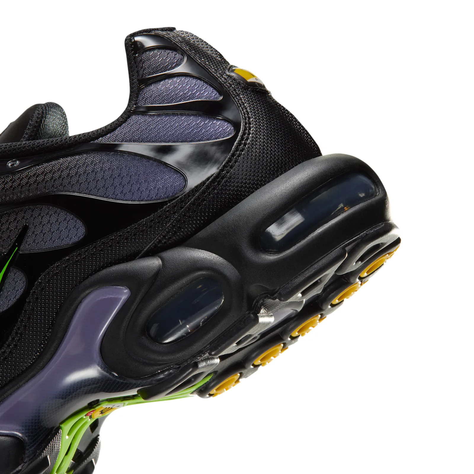 close-up angled heel and midsole detail, purple air unit and yellow eyelets, Joker