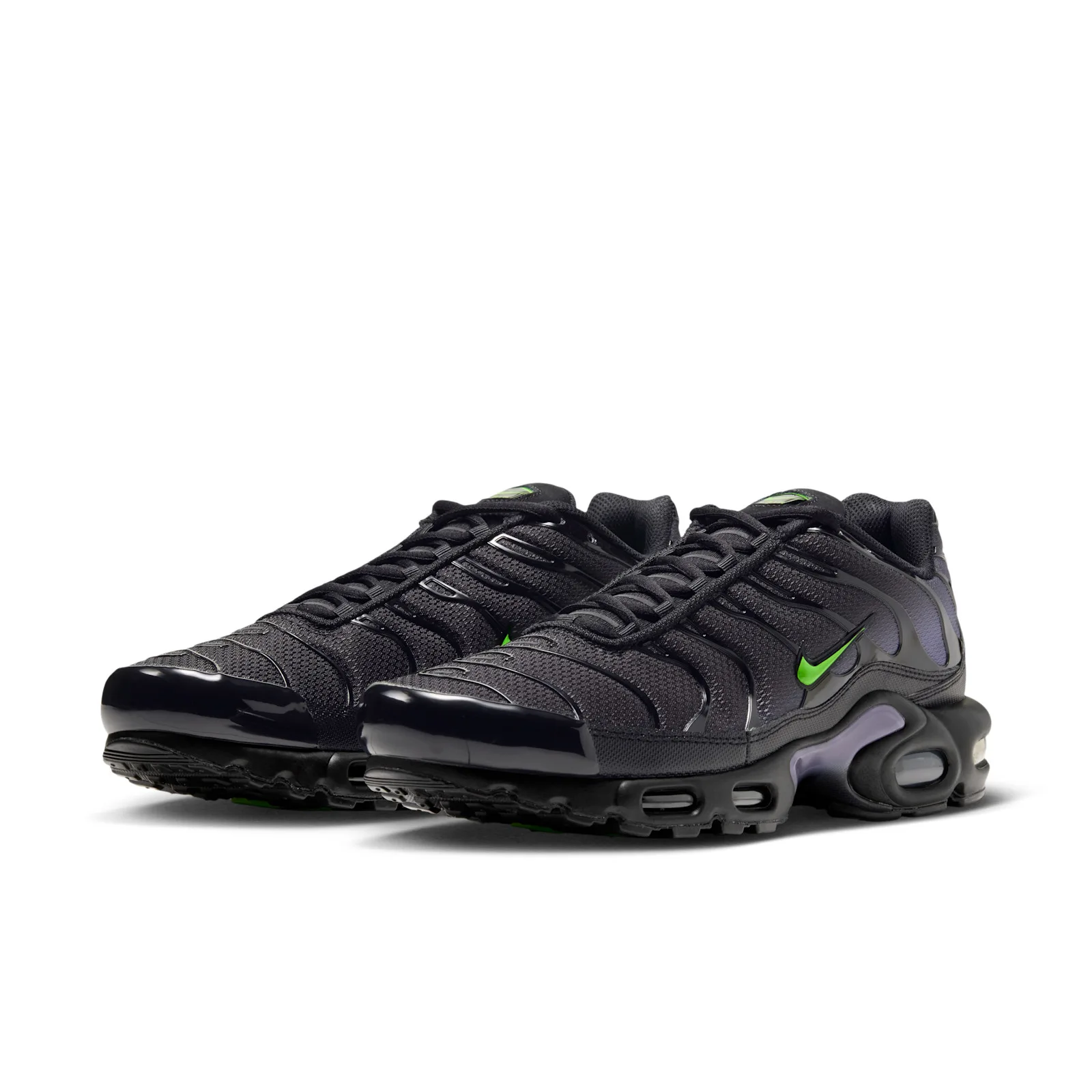 three-quarter pair view, black mesh with green swooshes and purple heel pods, Joker