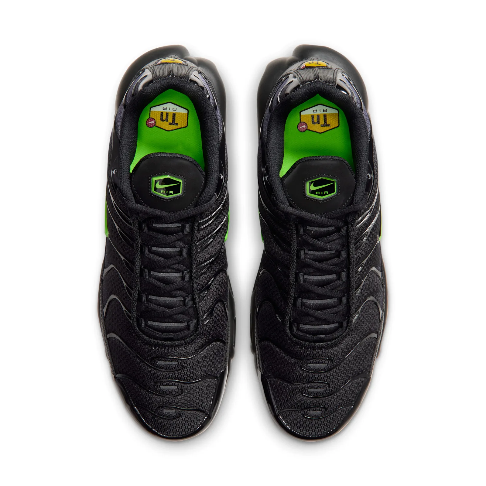 top-down pair view, green insoles with Tn Air logo and black laces, Joker