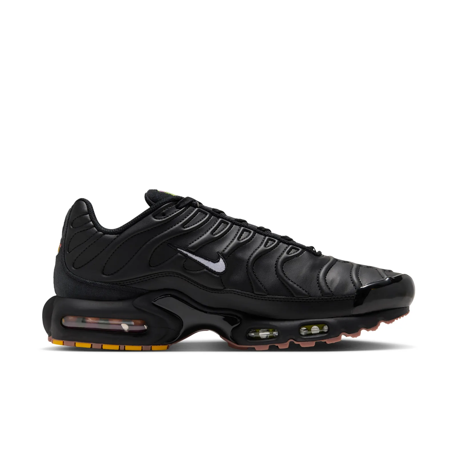 lateral three-quarter view, black upper, yellow-orange tab at heel, pink outsole with orange trim, Premier