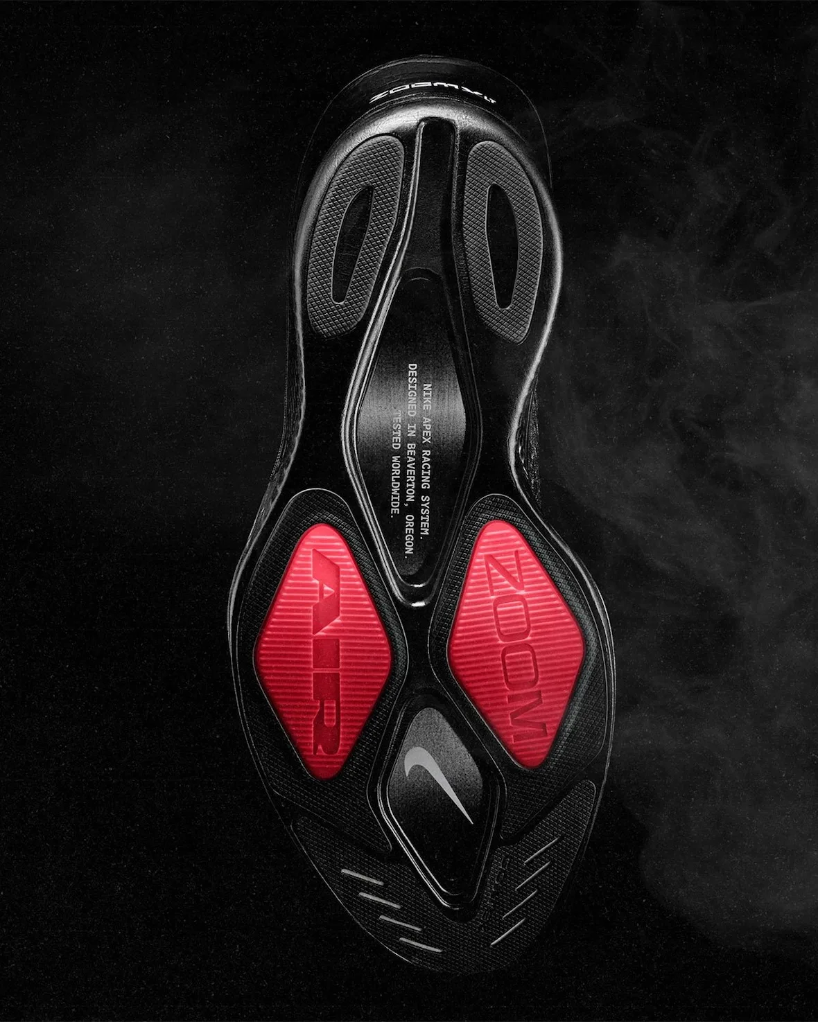 outsole view, black sole with red air and zoom panels, nike apex racing text, Nike Apex