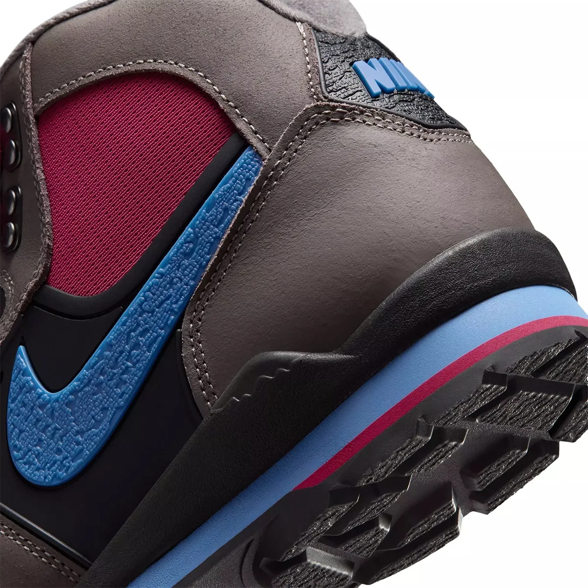 close-up of heel and outsole, blue swoosh patch and red-blue midsole stripes, Cave Stone/Mystic Hibiscus