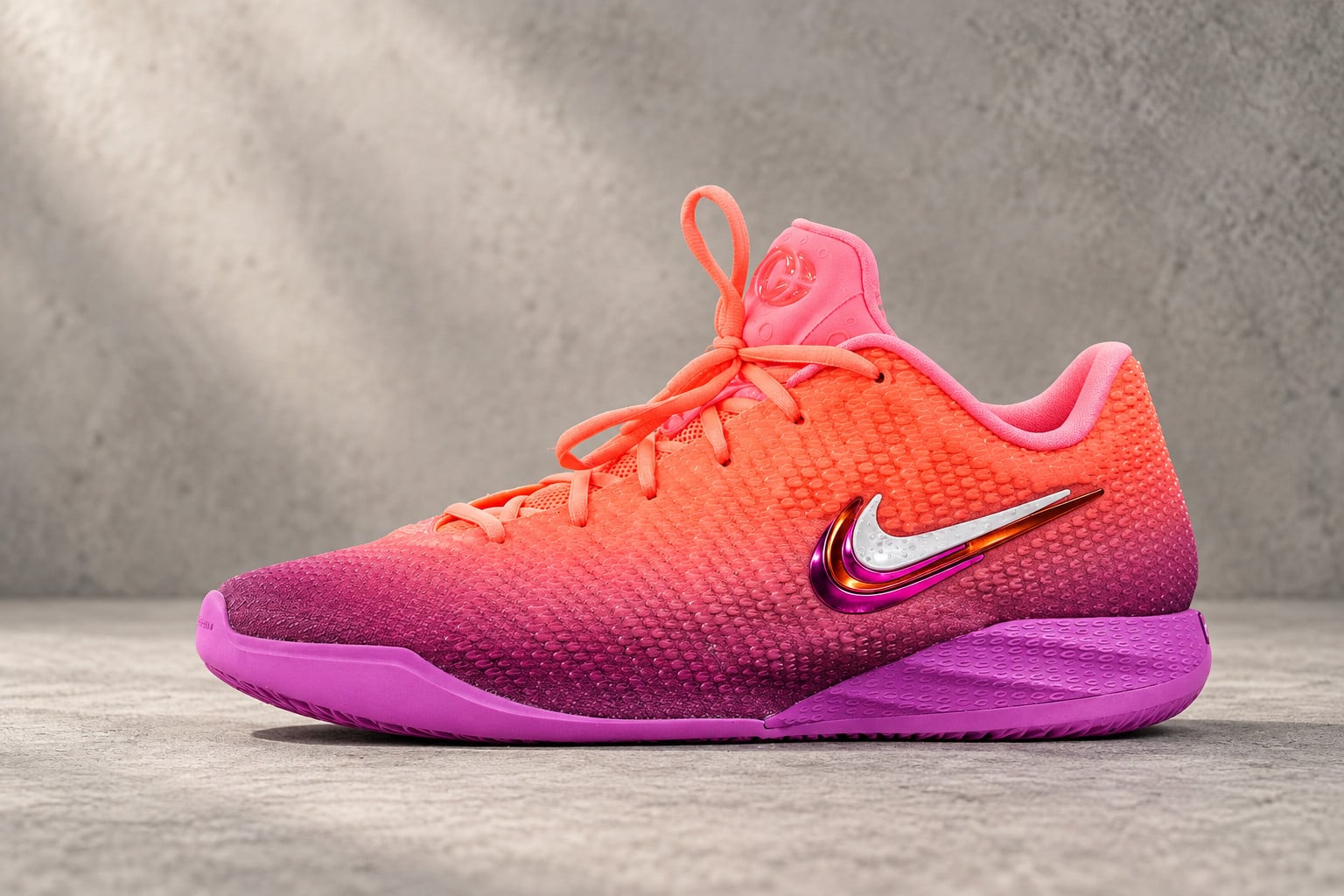 Lateral studio shot on grey backdrop, orange-to-purple gradient with chrome swoosh, Berry Fade