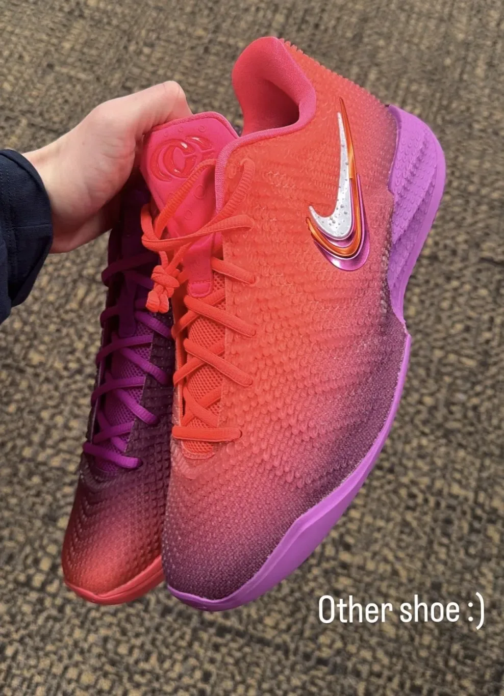 In-hand pair held up, orange-purple gradient shoes, 'other shoe' caption text, Berry Fade