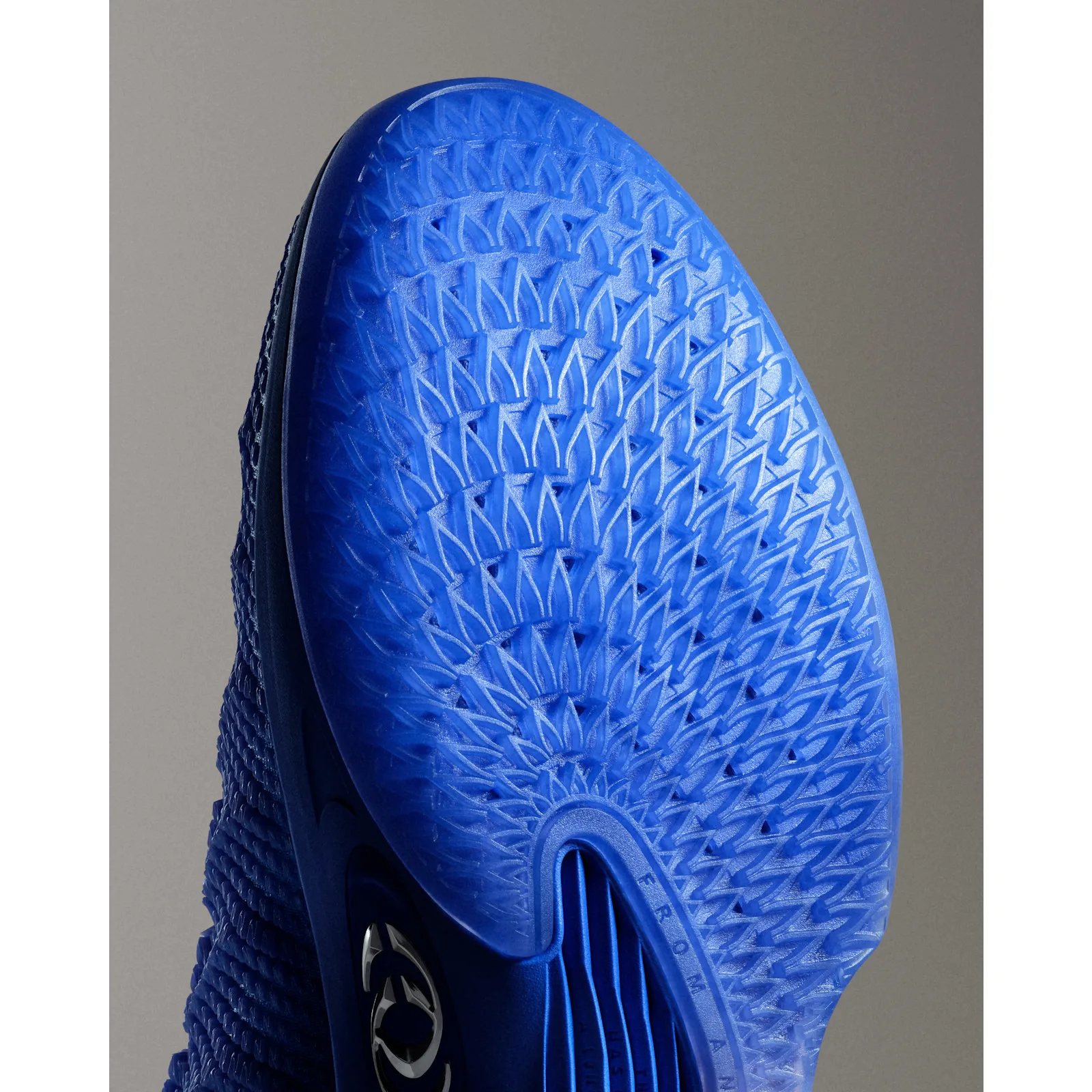 close-up of toe outsole tread on grey background, blue rubber, Racer Blue/Pink