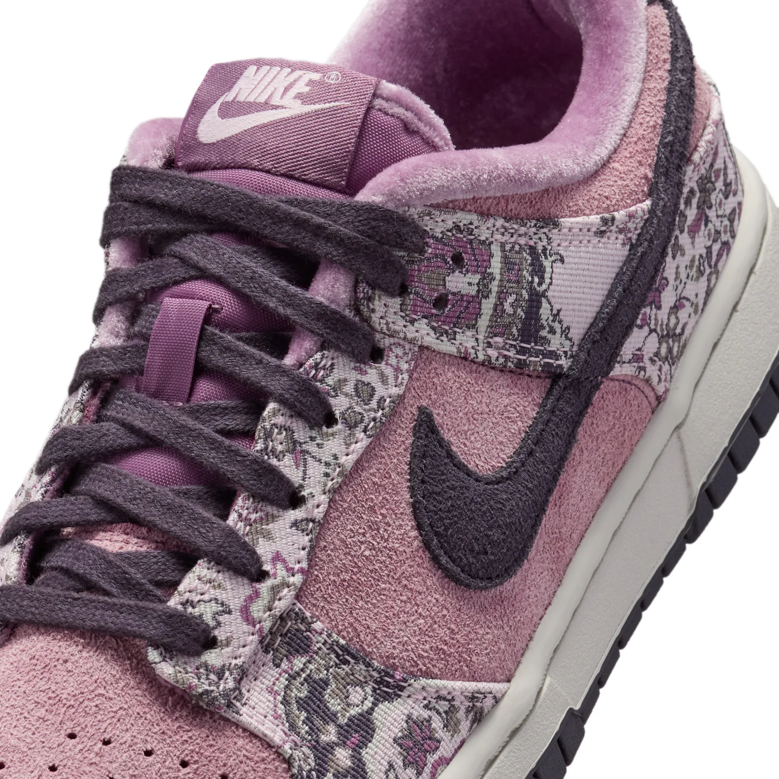 Close-up toe and laces, purple Nike tongue tag and dark grey swoosh, Botanical Rug
