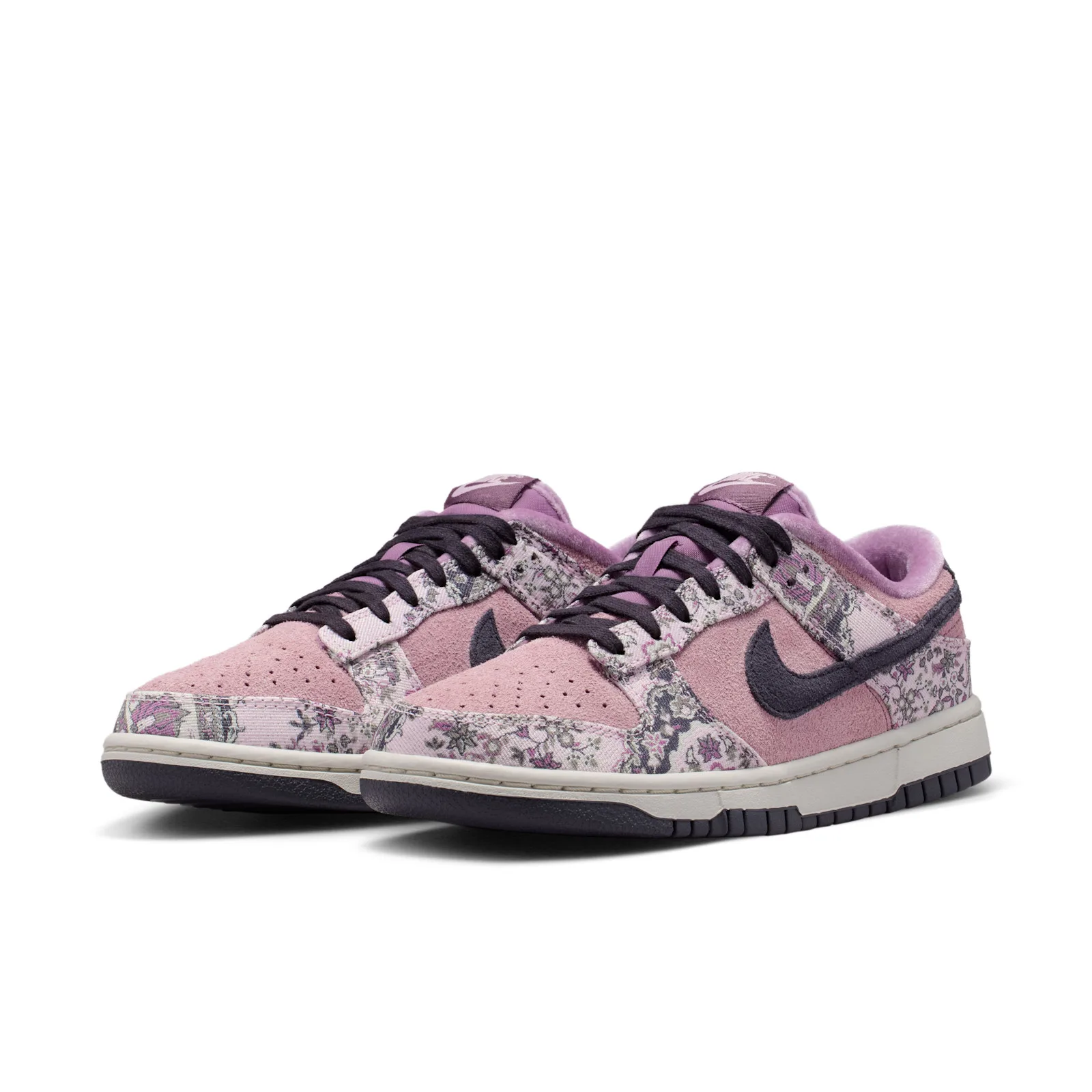Angled pair view, both shoes showing pink suede and floral fabric panels, Botanical Rug