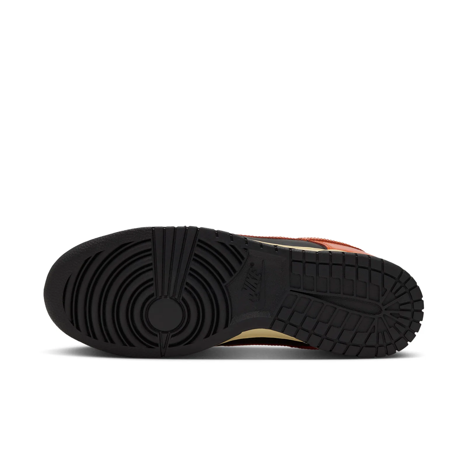 Outsole view on white background, black tread with tan midsole edge, Campfire Orange