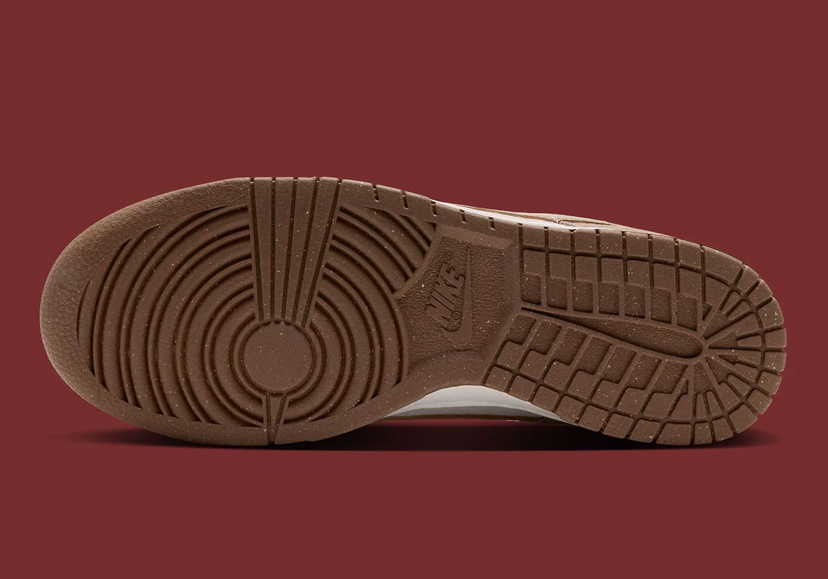 outsole tread close-up, brown rubber with circular heel pattern, Double Swoosh