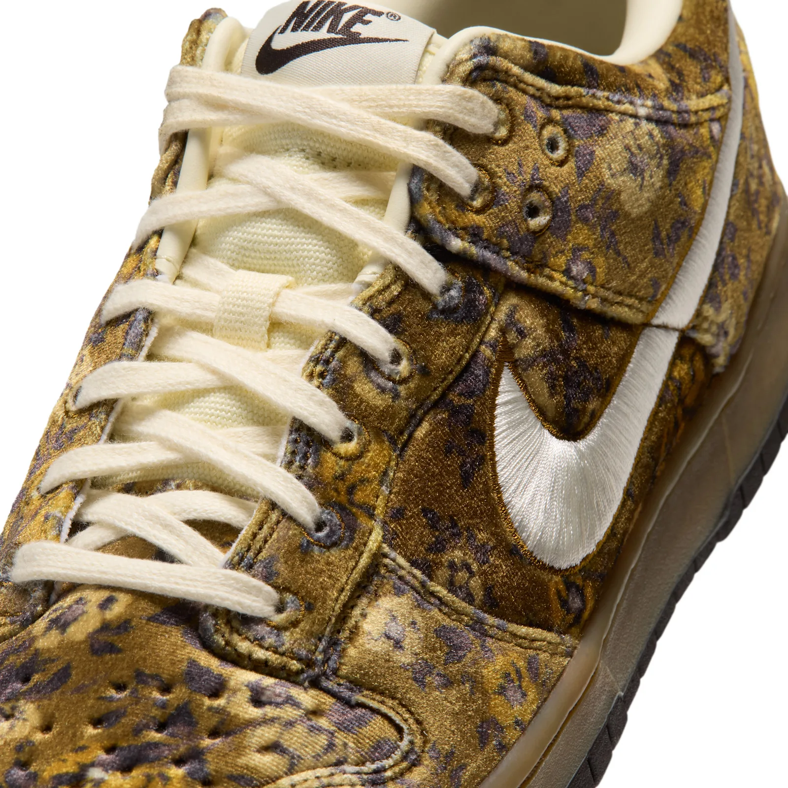 close-up toe and swoosh detail, cream stitched swoosh on floral velvet, Golden Hops/Velvet Brown