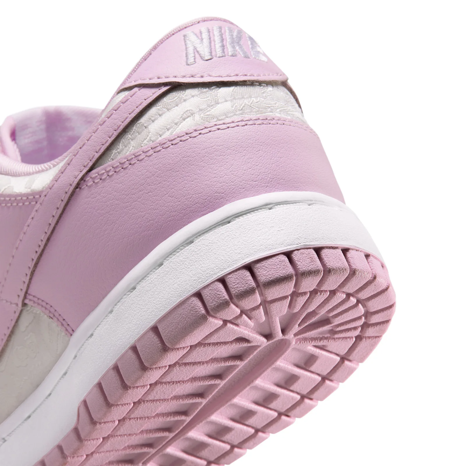 close-up heel and outsole, pink suede-look tread, NIKE tab, Pink Foam