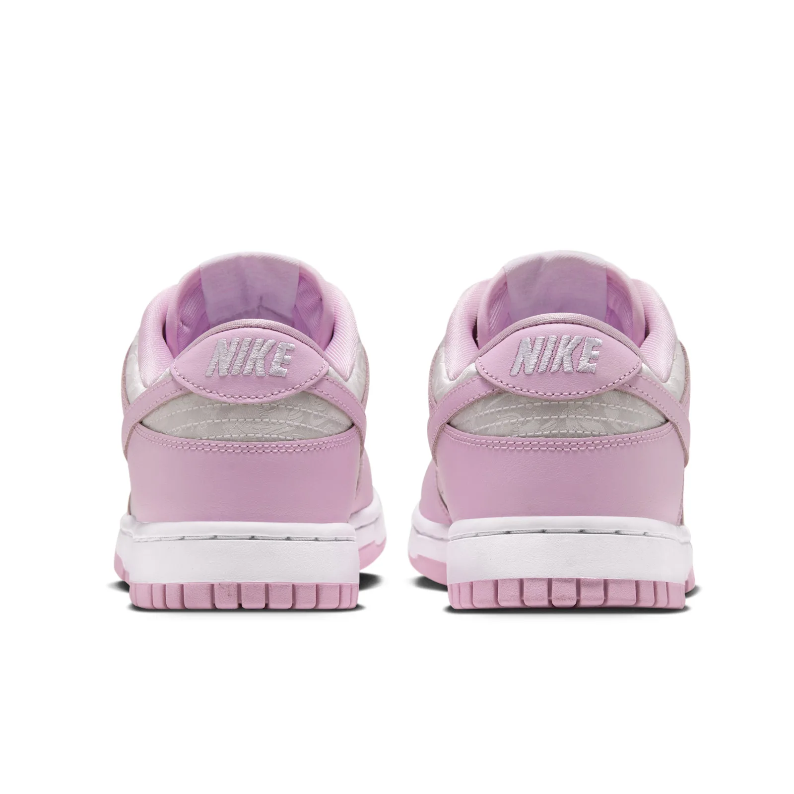 pair, heel view with pink NIKE tabs and floral jacquard overlays, Pink Foam