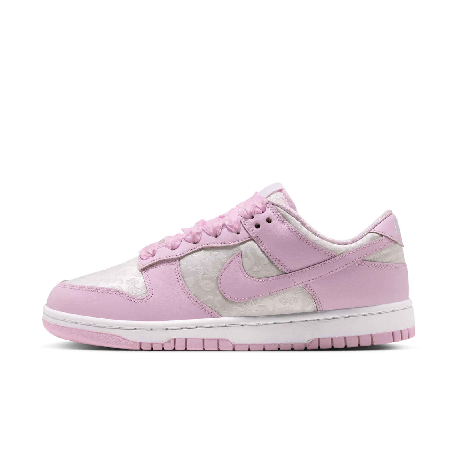lateral view, pink swoosh over white floral jacquard toe and heel, Pink Foam