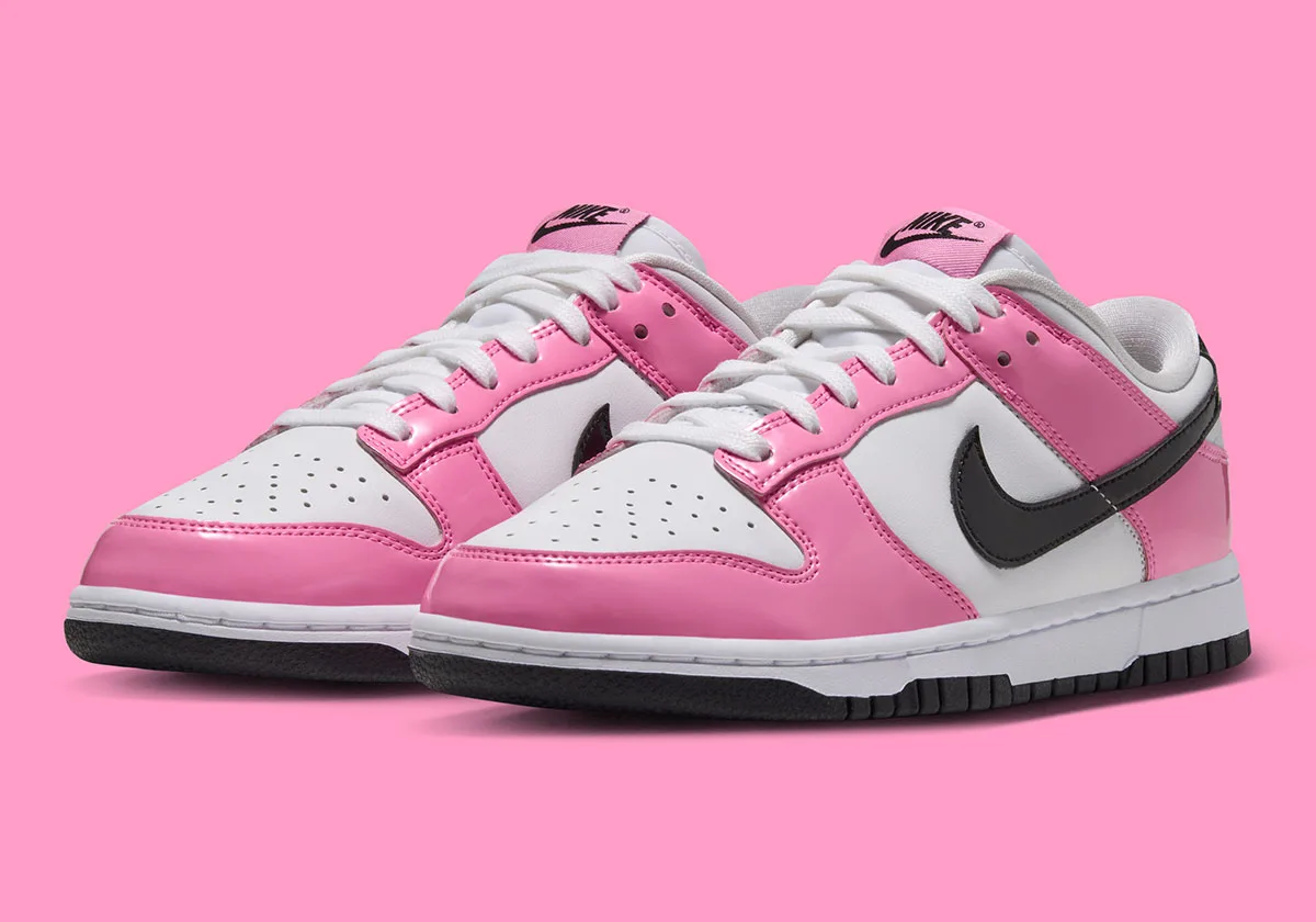 front three-quarter view of pair, pink toe caps and black patent swooshes, Pink Spell