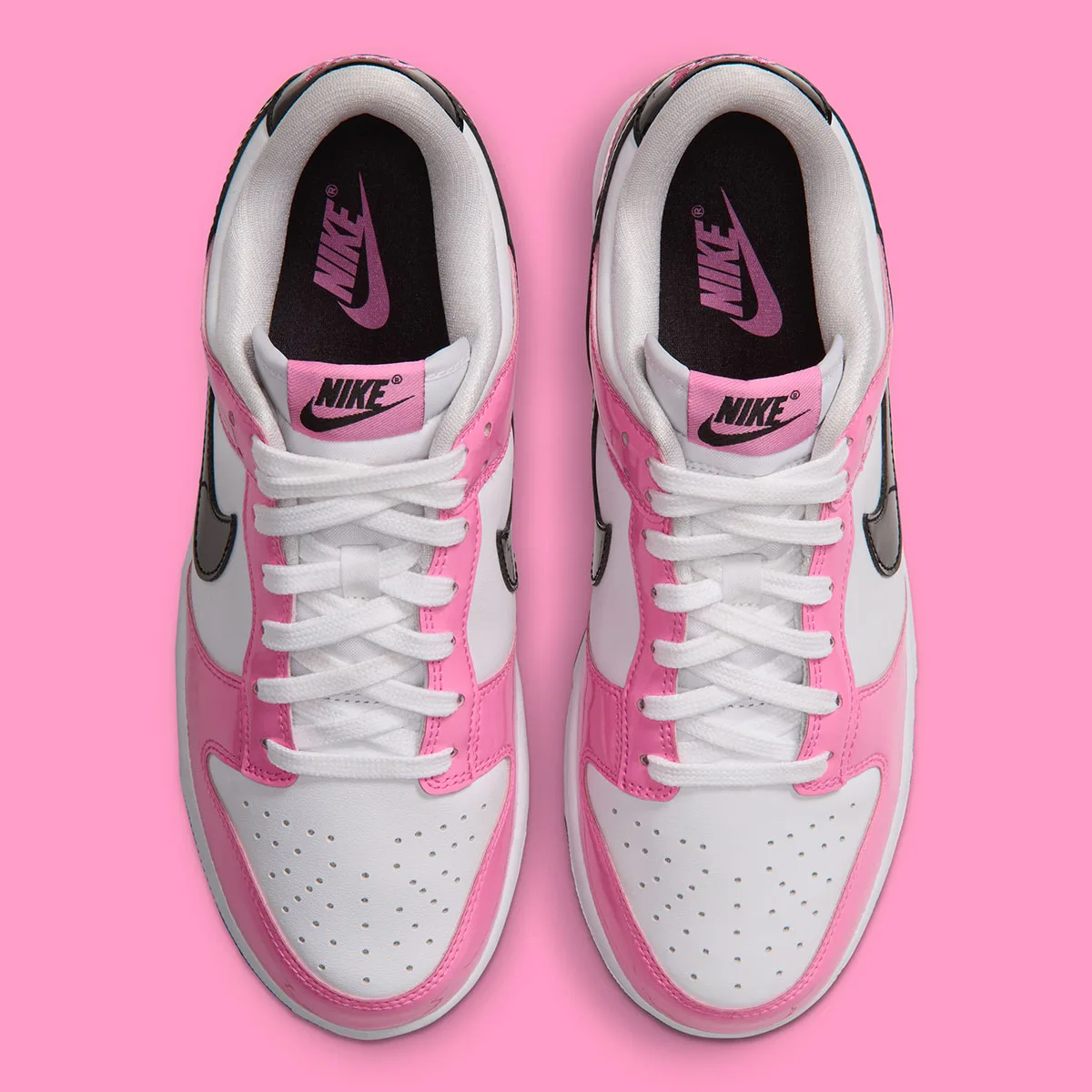 top-down view of pair, pink tongue tabs and black NIKE branding on insoles, Pink Spell