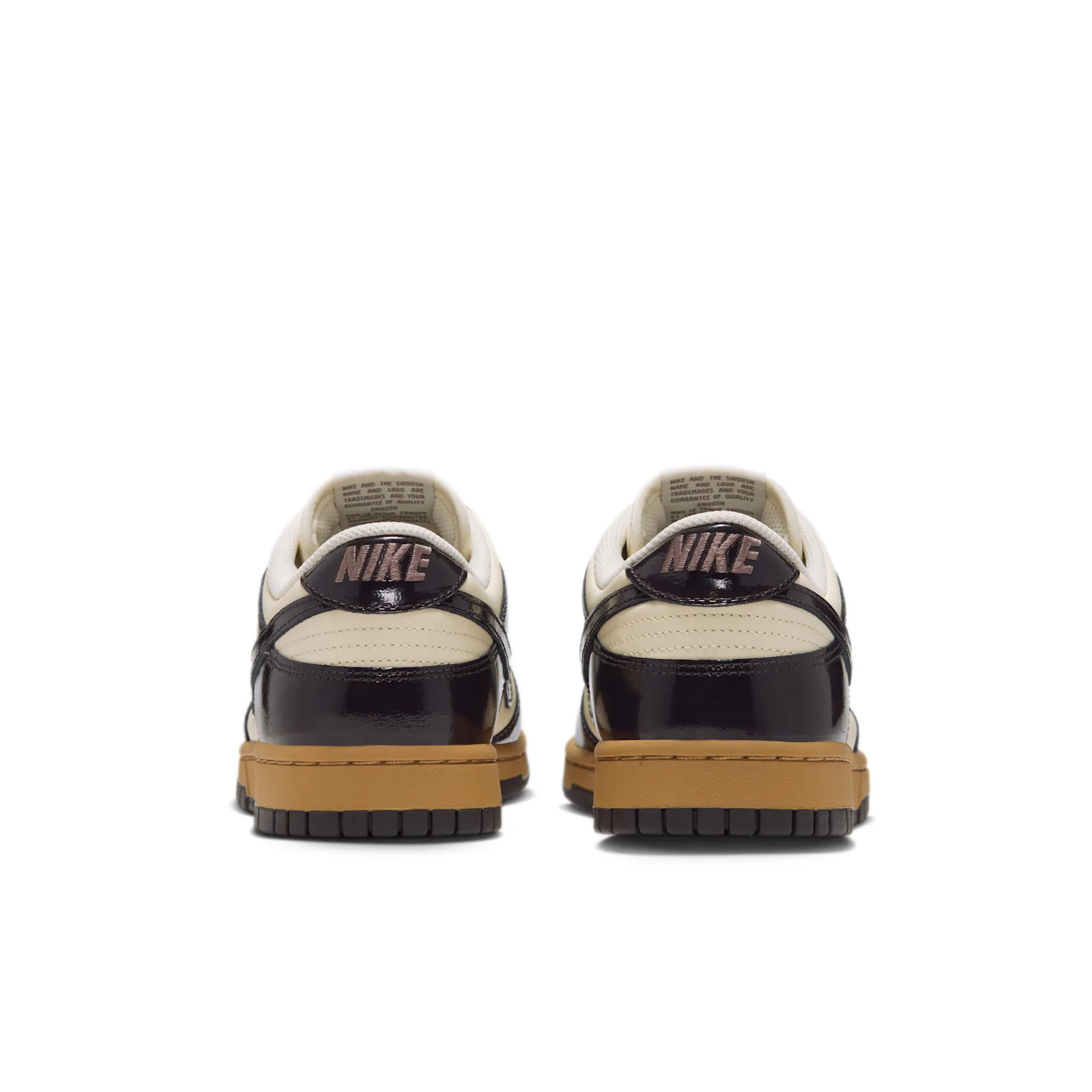 heel view of pair, brown Nike text on heel tab, gum midsole, Shadow Brown