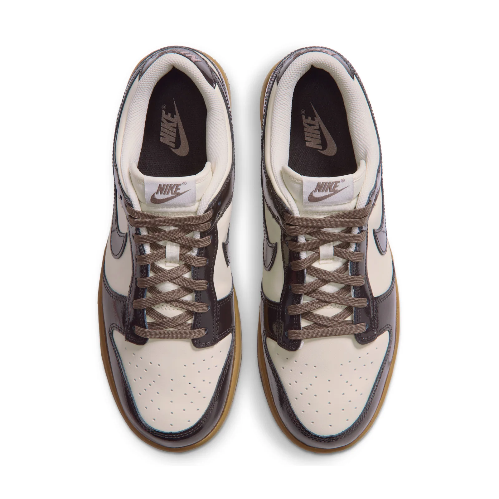outsole view, dark tread pattern with Nike branding, gum sidewall edge, Shadow Brown