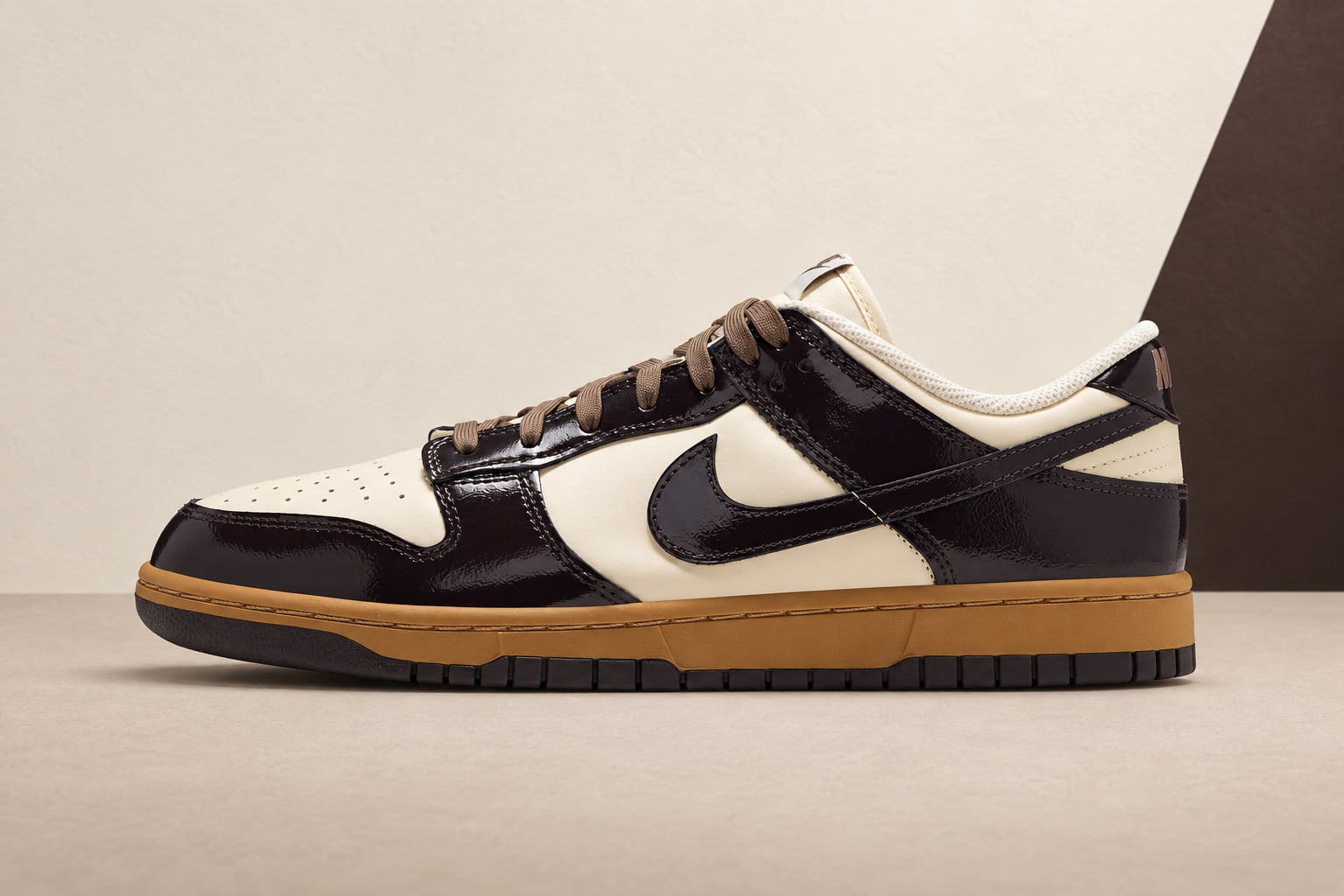 lateral view, dark brown patent overlays on cream base, gum outsole, Nike Dunk Low "Shadow Brown"