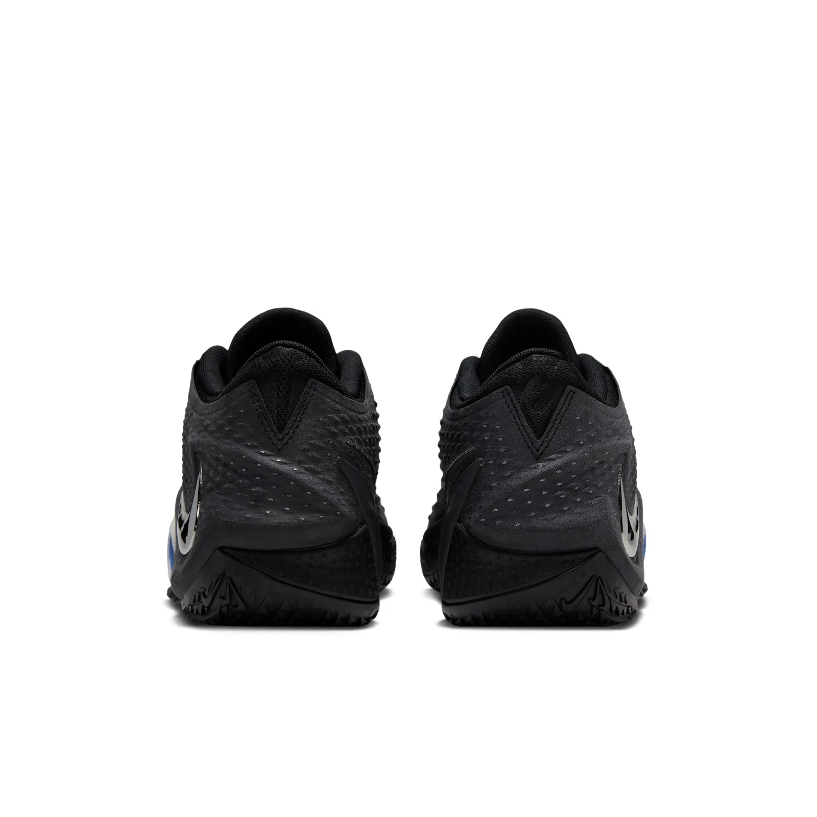 heel view of pair, black textured counters with tonal swooshes, Dark Mode