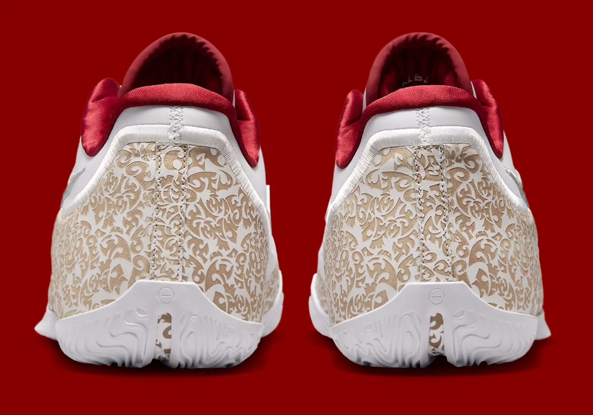 heel view of pair showing gold paisley print and red tongue linings, Laser