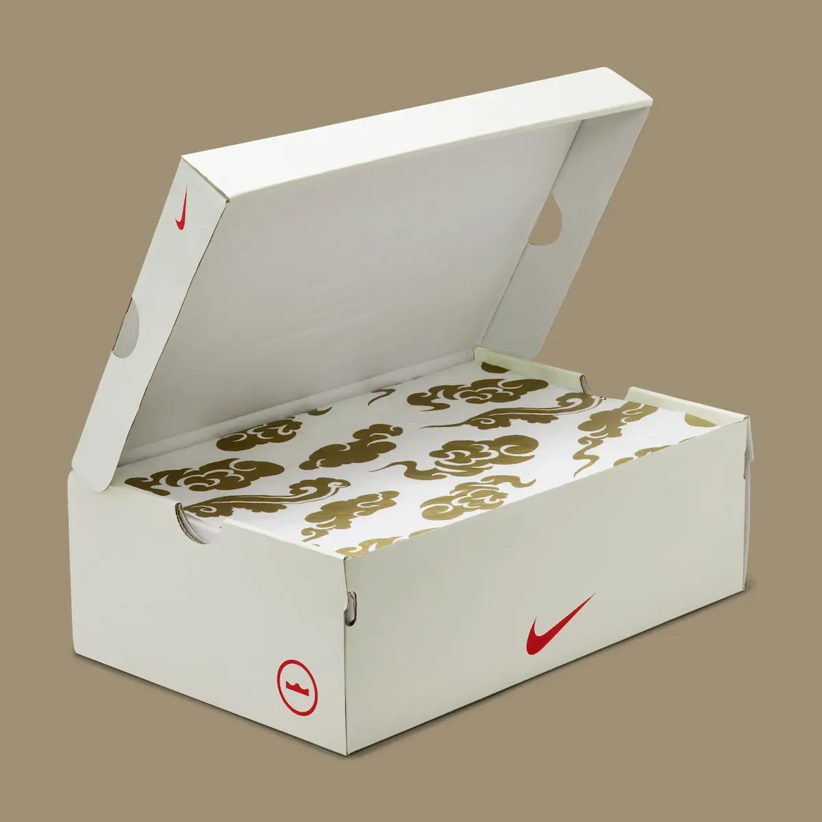 open shoebox showing gold cloud-print tissue paper inside, Lunar New Year