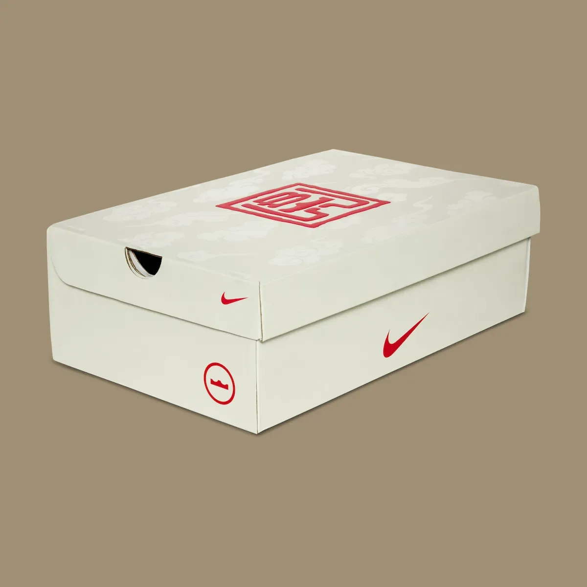 closed shoebox with a red Chinese seal-style graphic on the lid, Lunar New Year