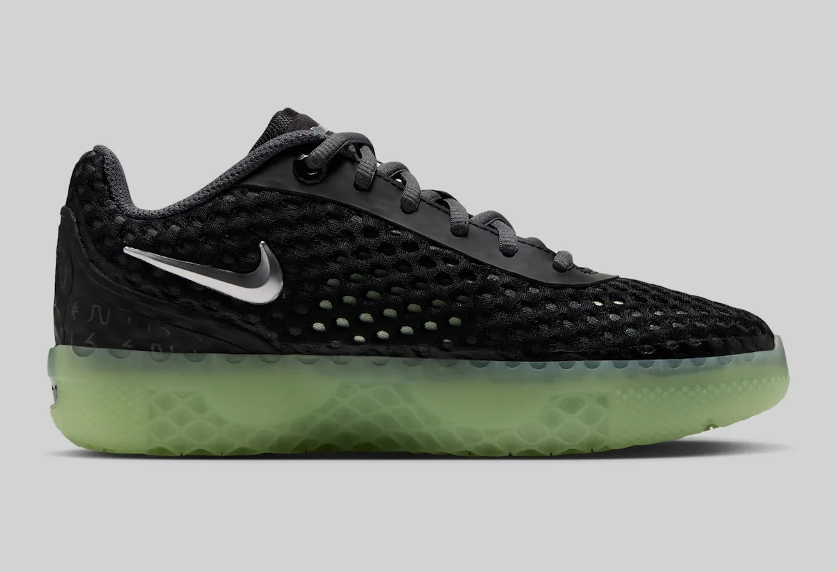 lateral view, black mesh upper with silver swoosh and green translucent sole, LeBron Witness 10