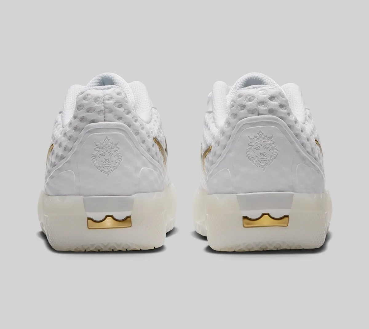 heel view pair, white with embossed gold lion crest and gold heel clip, LeBron Witness 10