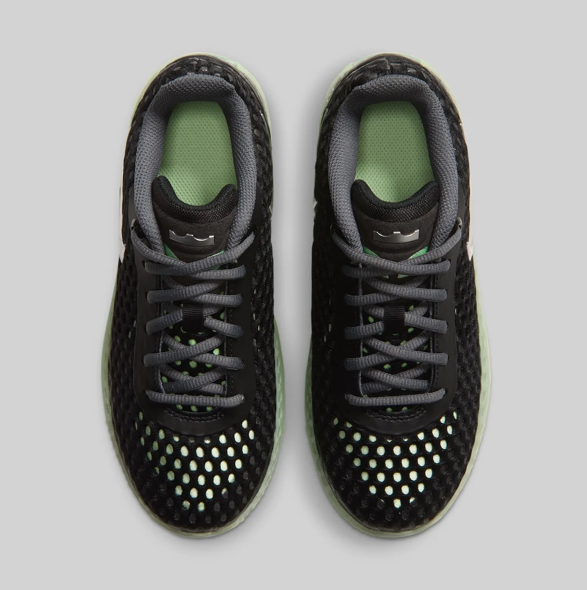 top-down pair, black mesh with green insoles and grey crown tongue tabs, LeBron Witness 10