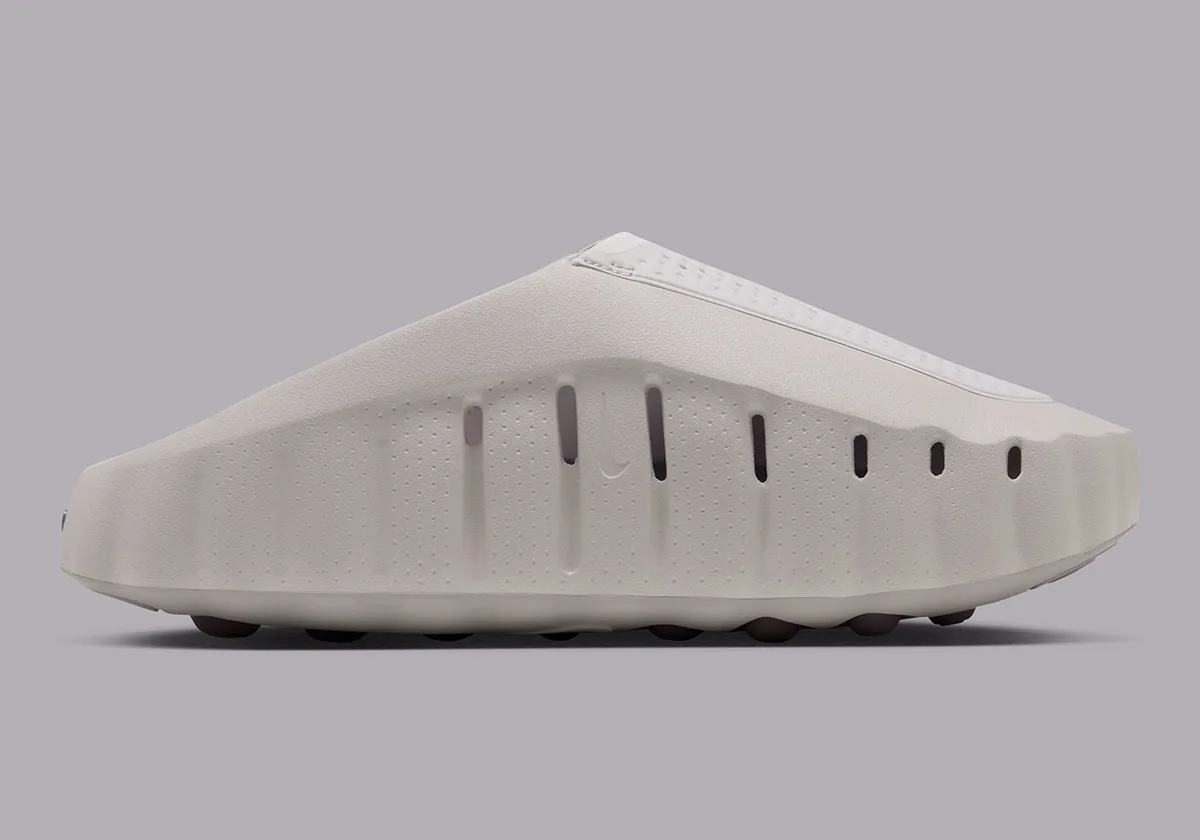 close-up lateral view showing perforated toe panel and ribbed midsole with vented slits, Purple Smoke