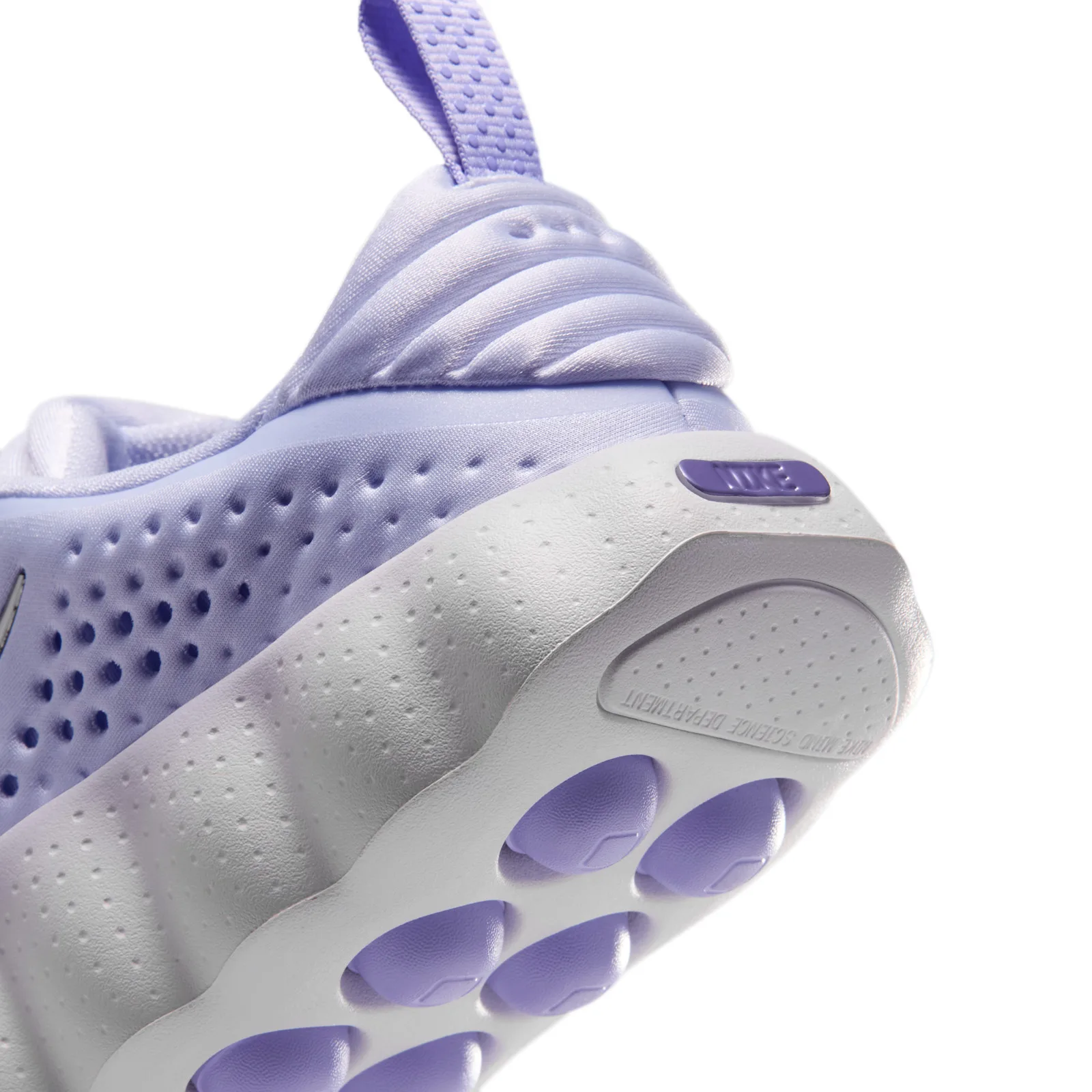 close-up heel and tongue, purple pull loop, ribbed panel, Nike tab on midsole, Palest Purple