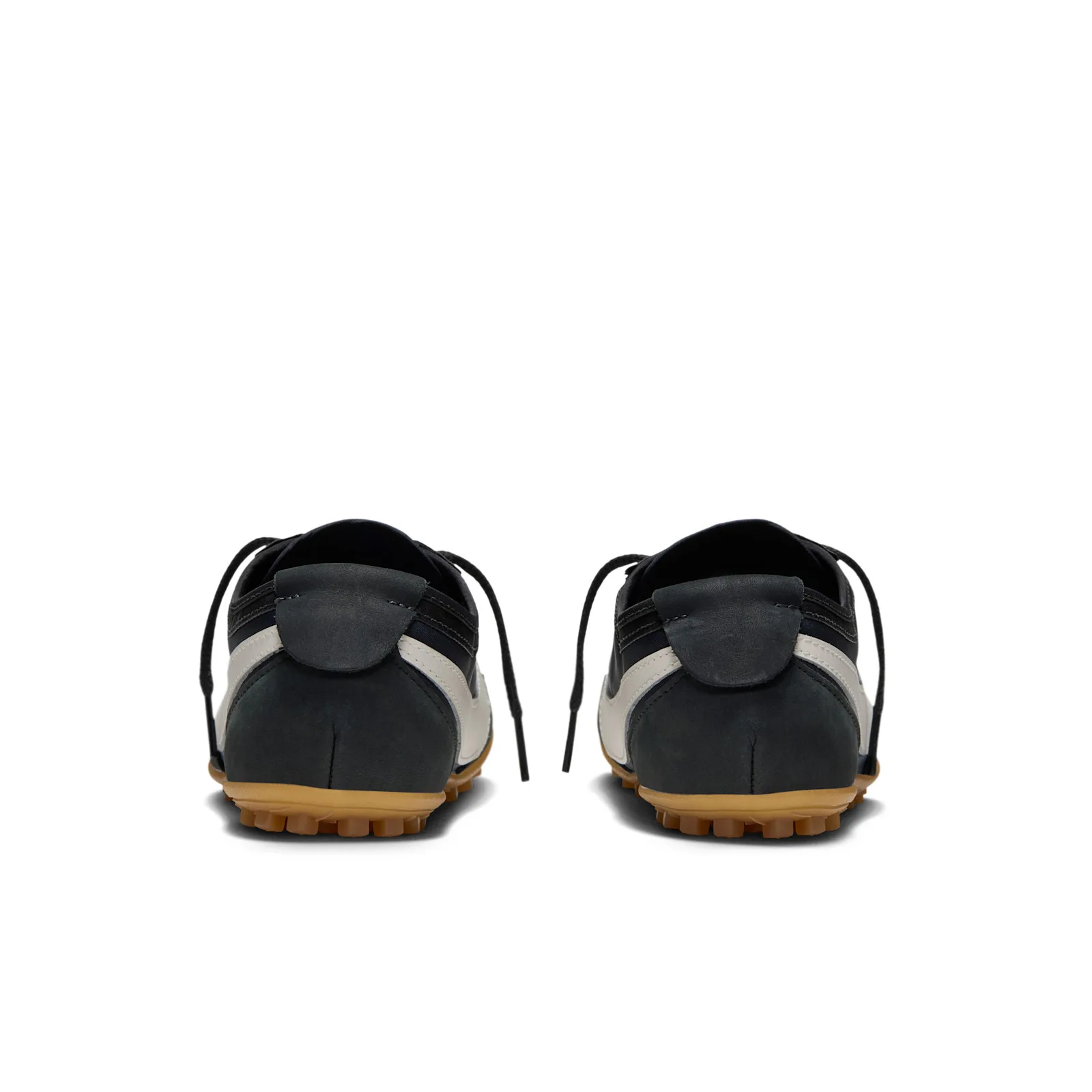 Heel view of pair, dark heel tabs with off-white stripe, gum soles, Off Noir