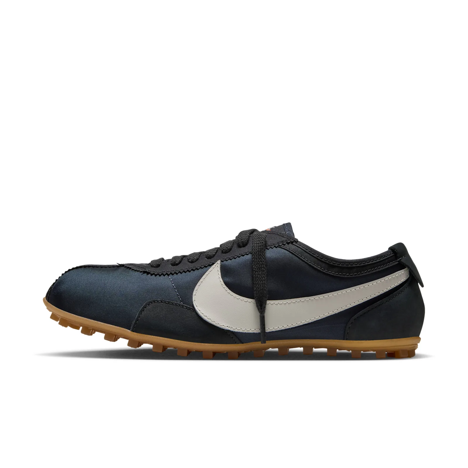 Lateral view on white, navy-black upper, off-white swoosh, gum studded sole, Off Noir
