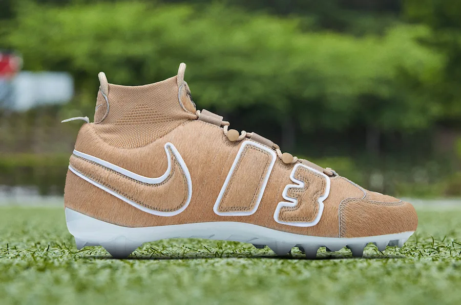 lateral view, tan calf-hair upper with white-outlined swoosh and '13', OBJ Uptempo Cleat