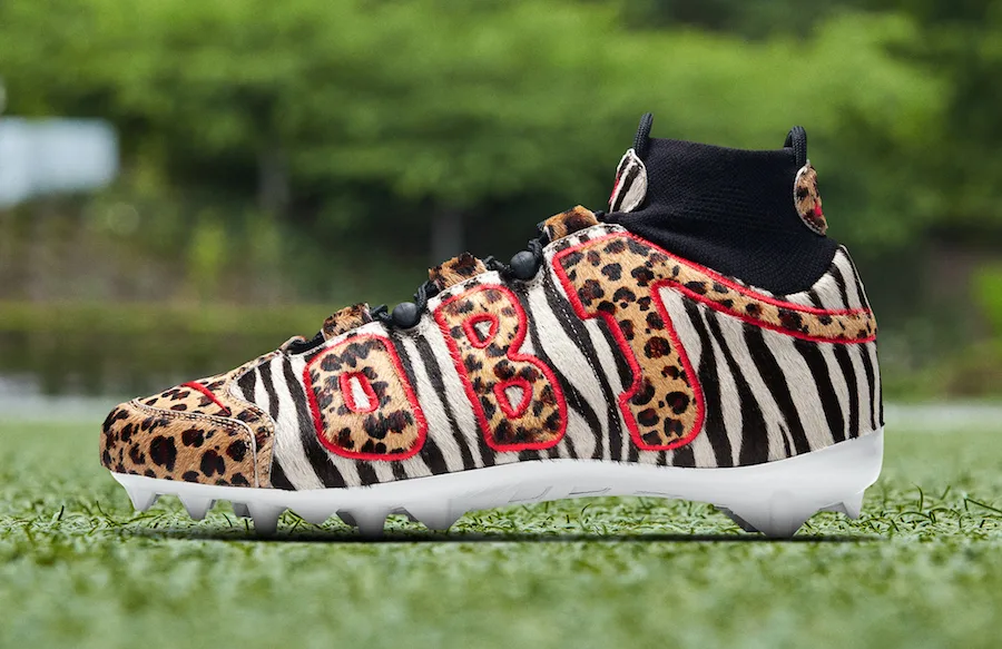 lateral view, zebra and leopard calf-hair upper with red-outlined 'OBJ', black collar, OBJ Uptempo Cleat