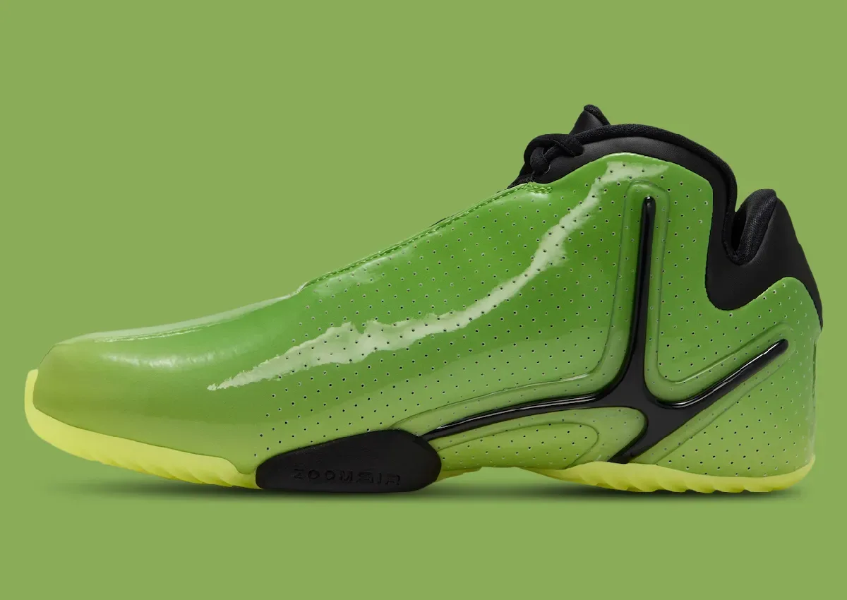 lateral view on green background, glossy green toe fading to yellow midsole, Green Apple