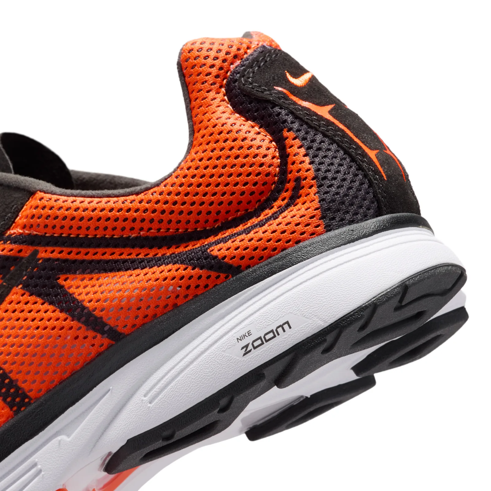 close-up of heel and midsole showing white Nike Zoom text on white foam, Safety Orange