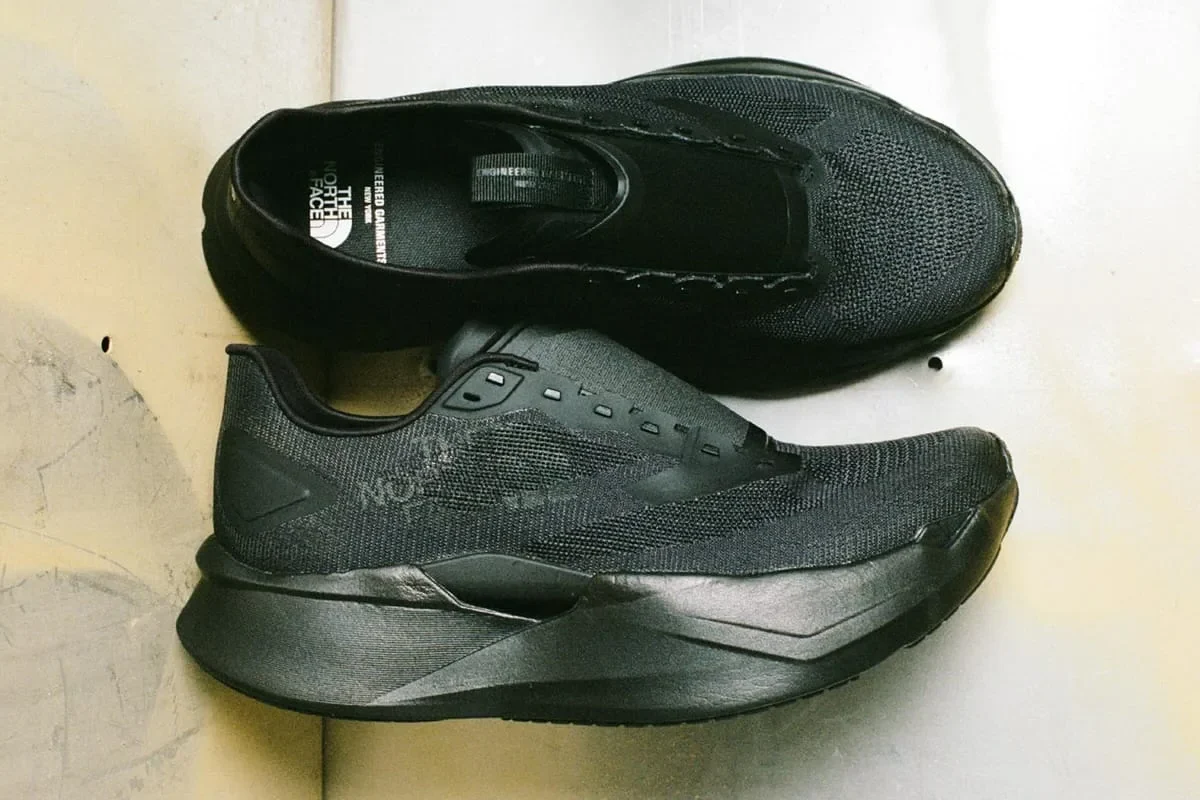 top-down pair on cream floor, showing insole text Engineered Garments x The North Face, Garments VECTIV Forward